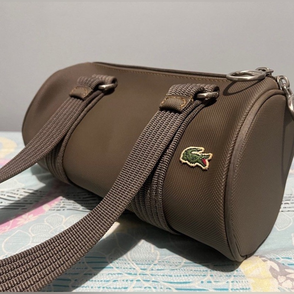 LACOSTE 🐊 adjustable, crossbody army green barrel purse. USED TWICE!!
